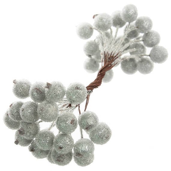 Frosted silver berries of mountain ash on a thin wire. 